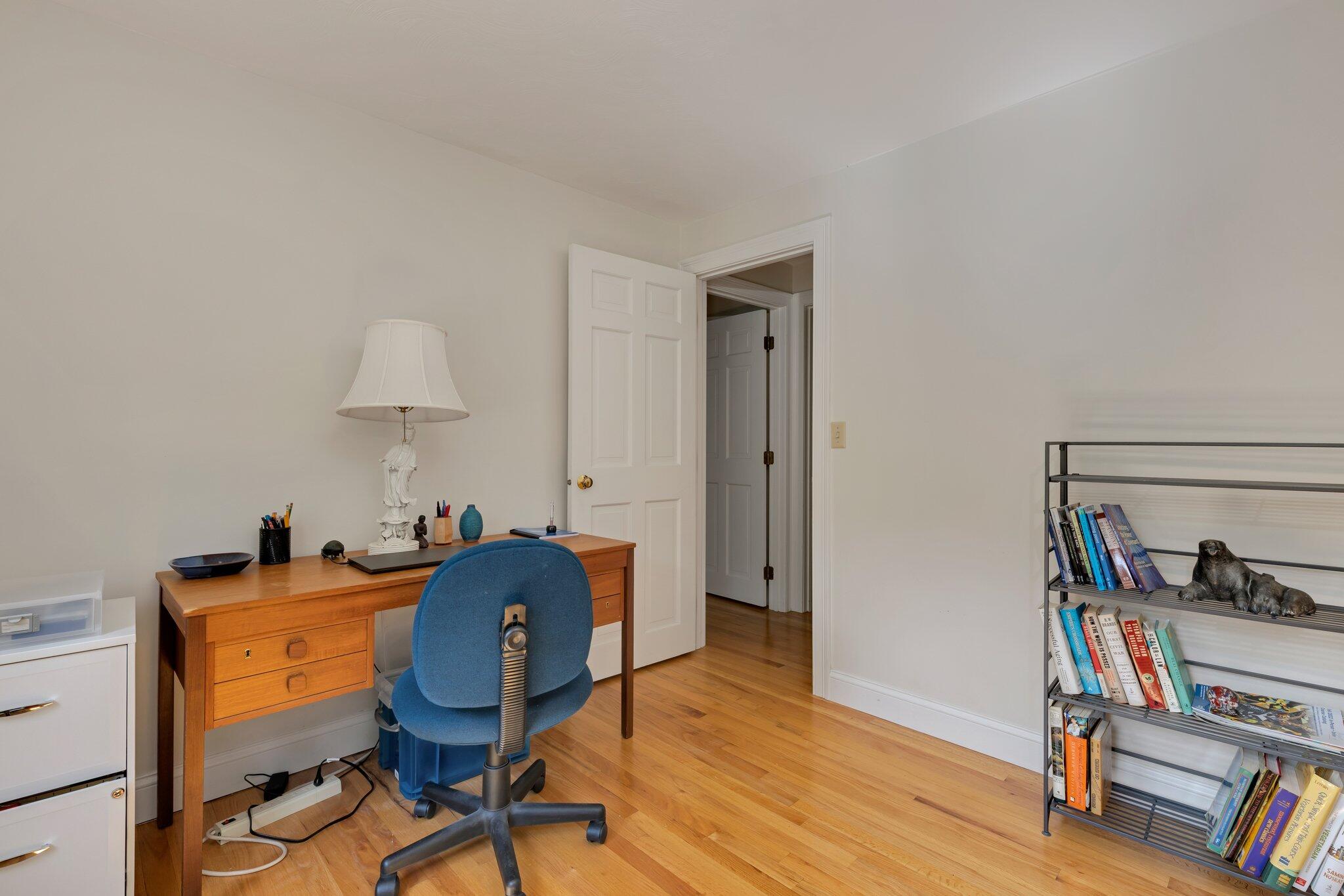 79 Mountwood Road Marstons Mills, MA 02648 - Photo 18 of 33 a workspace with furniture and wooden floor