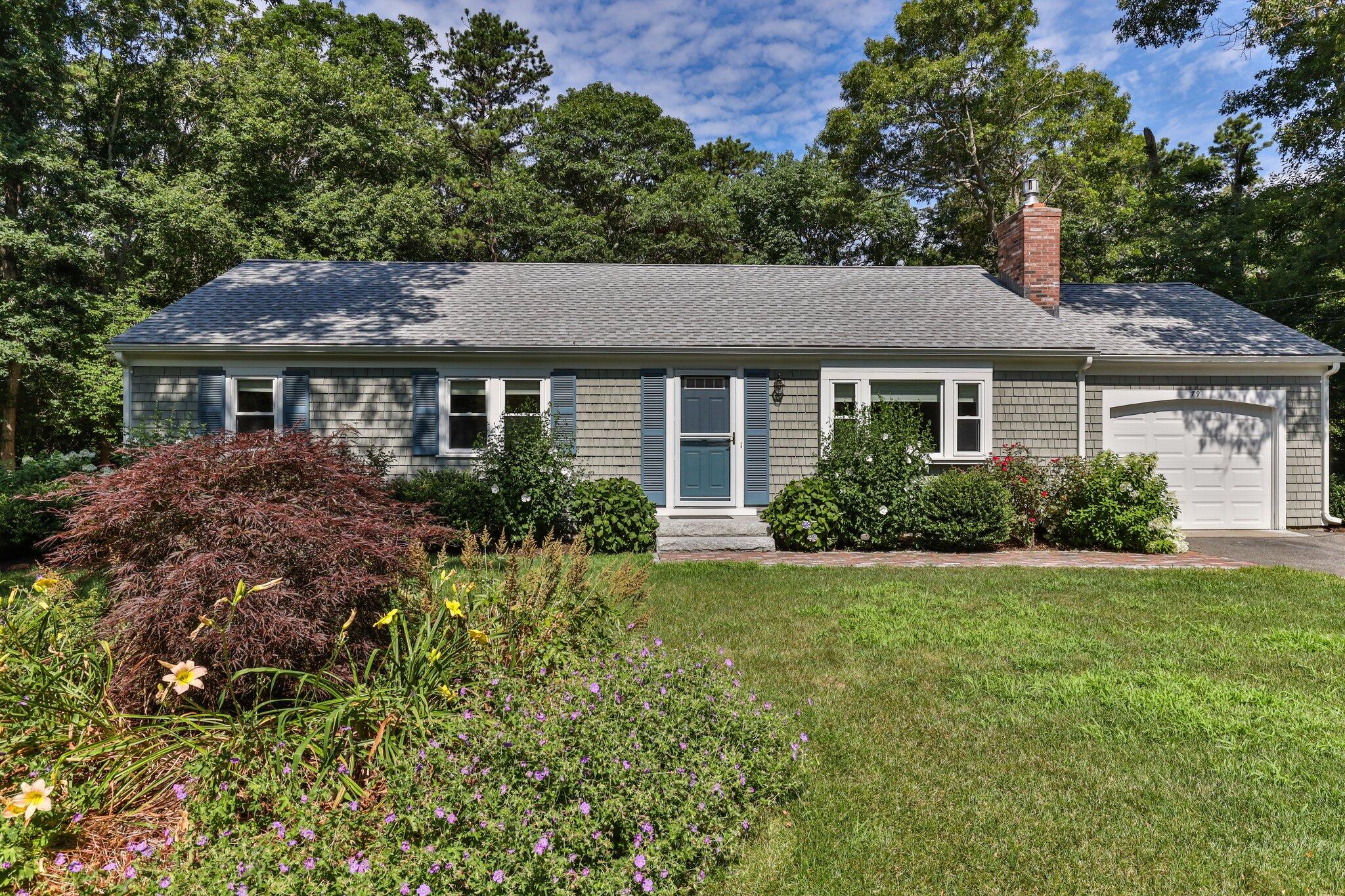 79 Mountwood Road Marstons Mills, MA 02648 - Photo 2 of 33 a front view of a house with a yard
