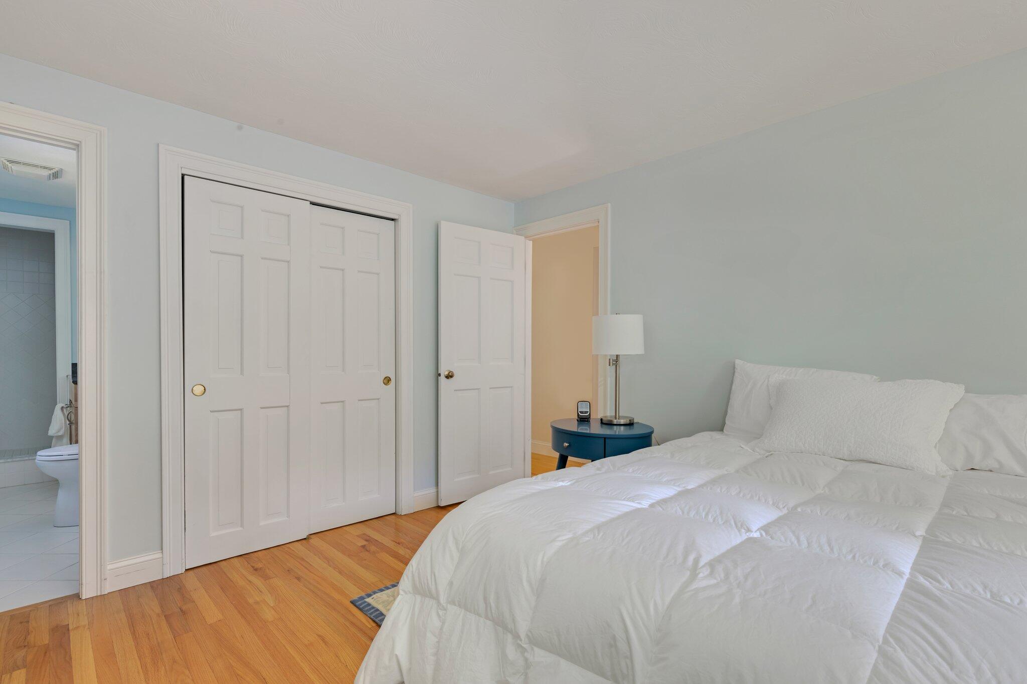 79 Mountwood Road Marstons Mills, MA 02648 - Photo 23 of 33 a bedroom with a bed and a night stand