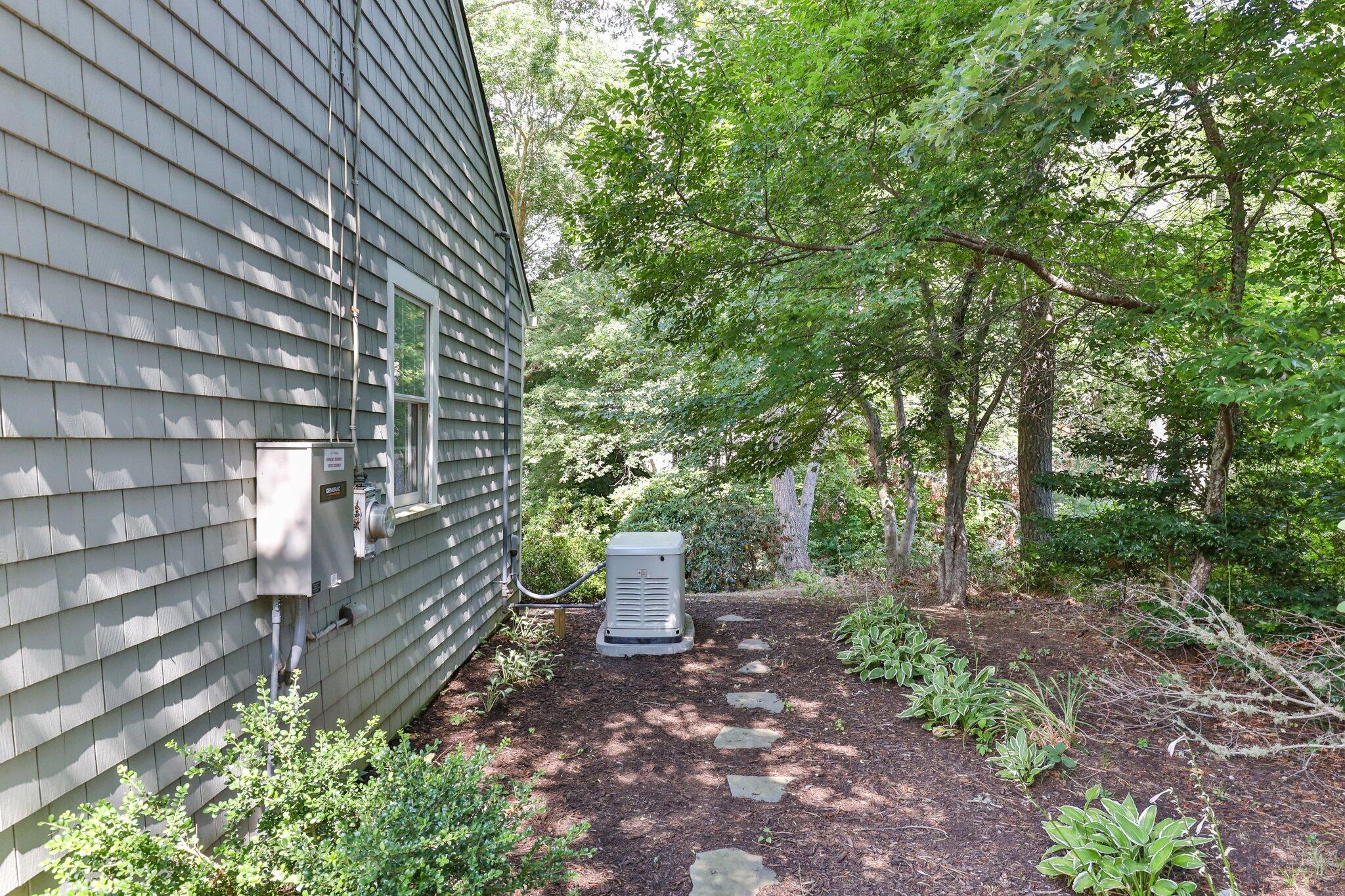79 Mountwood Road Marstons Mills, MA 02648 - Photo 26 of 33 a backyard of a house with lots of green space