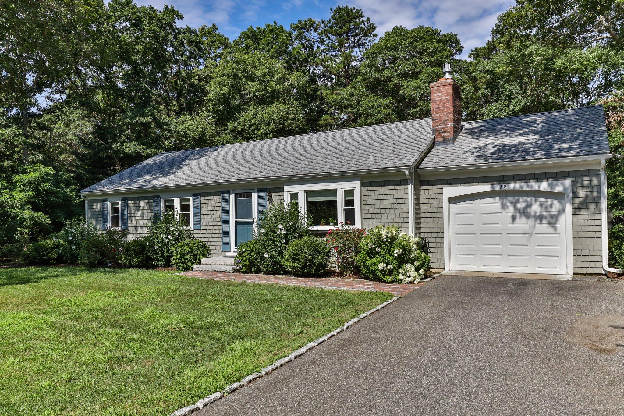 79 Mountwood Road Marstons Mills, MA 02648 - Photo 3 of 33 a front view of a house with a garden and yard