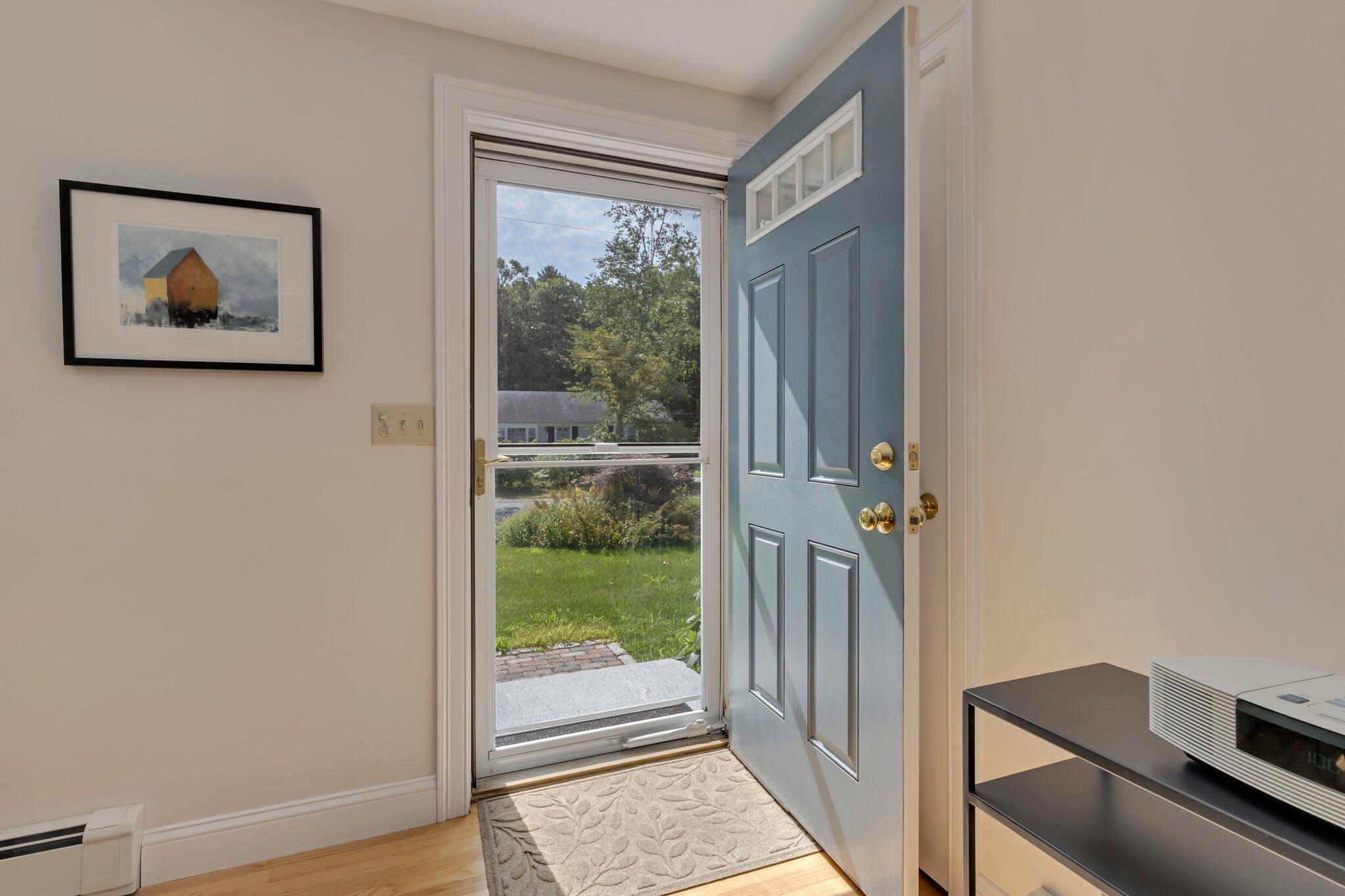 79 Mountwood Road Marstons Mills, MA 02648 - Photo 6 of 33 a view of a livingroom with wooden floor and a window