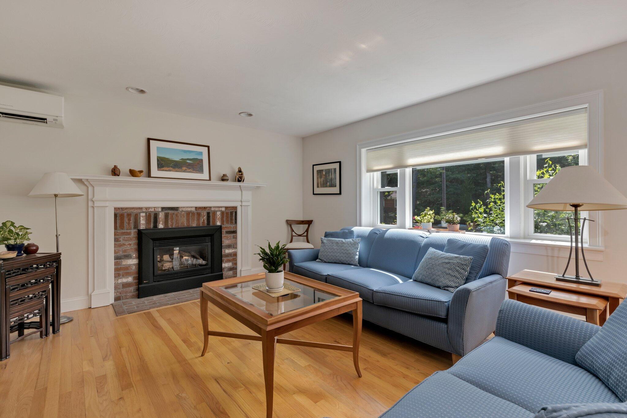 79 Mountwood Road Marstons Mills, MA 02648 - Photo 8 of 33 a living room with furniture and a fireplace