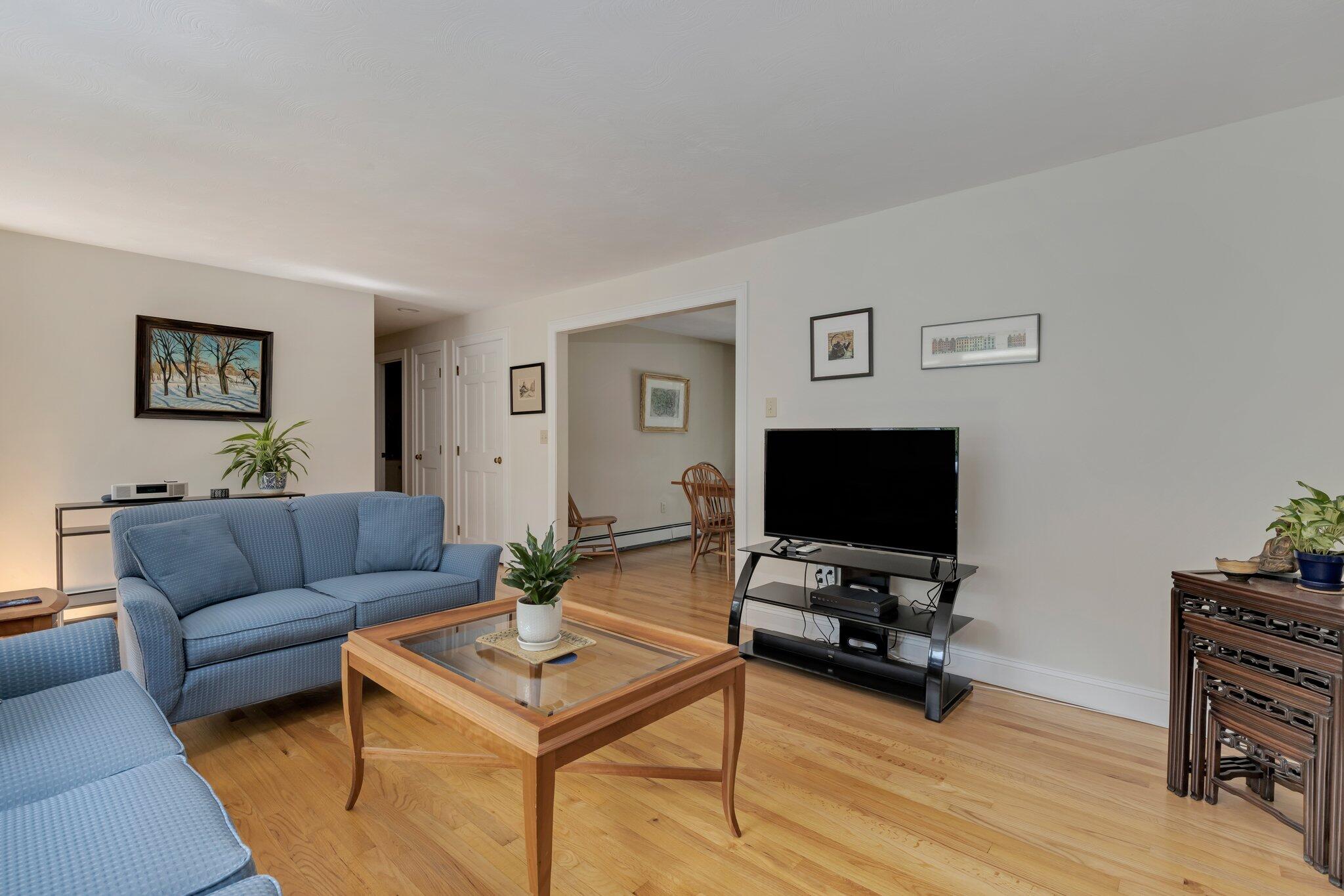 79 Mountwood Road Marstons Mills, MA 02648 - Photo 9 of 33 a living room with furniture and a flat screen tv
