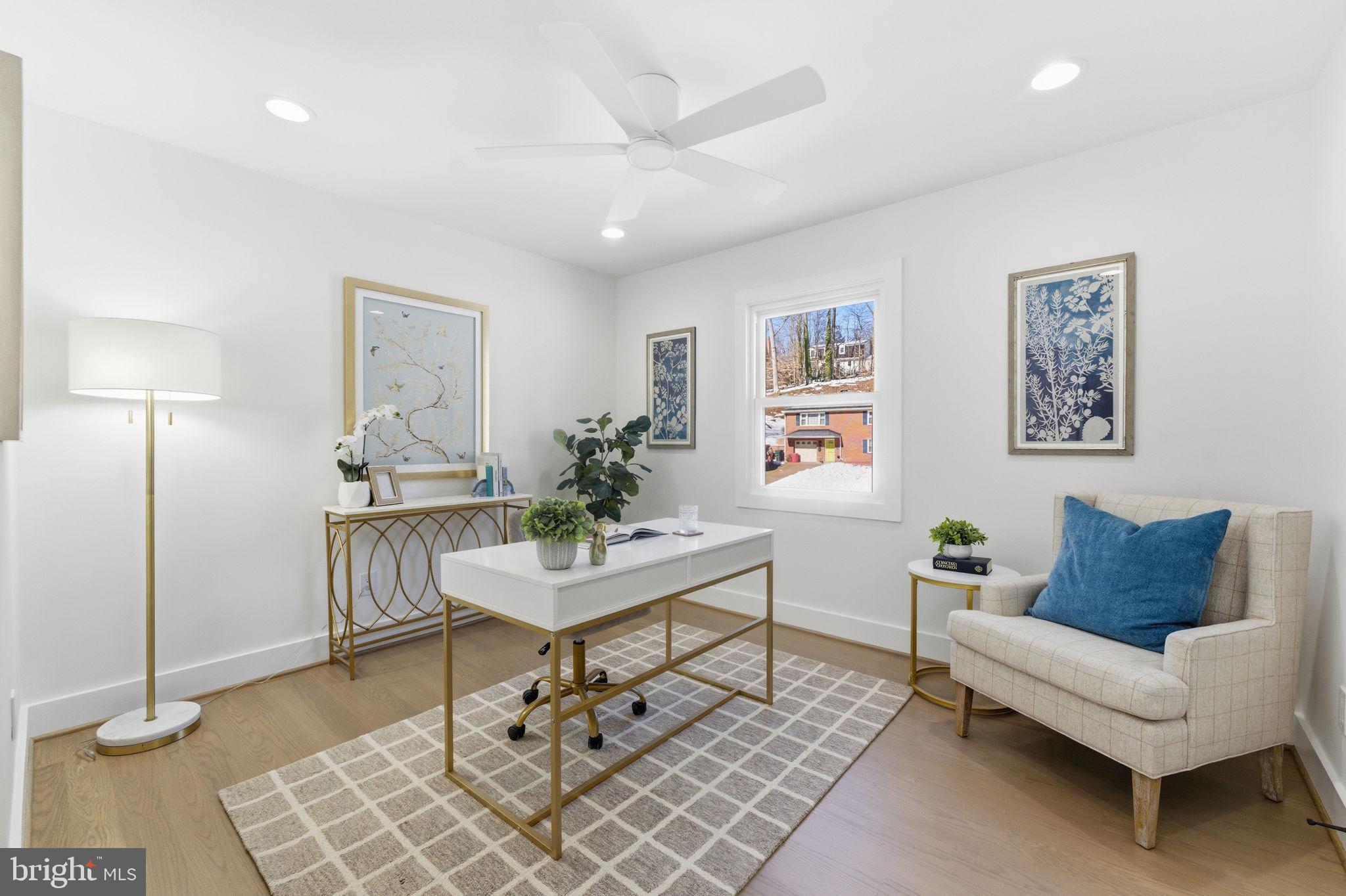 8615 Kerry Lane Springfield, VA 22152 - Photo 22 of 50 a living room with furniture and a potted plant
