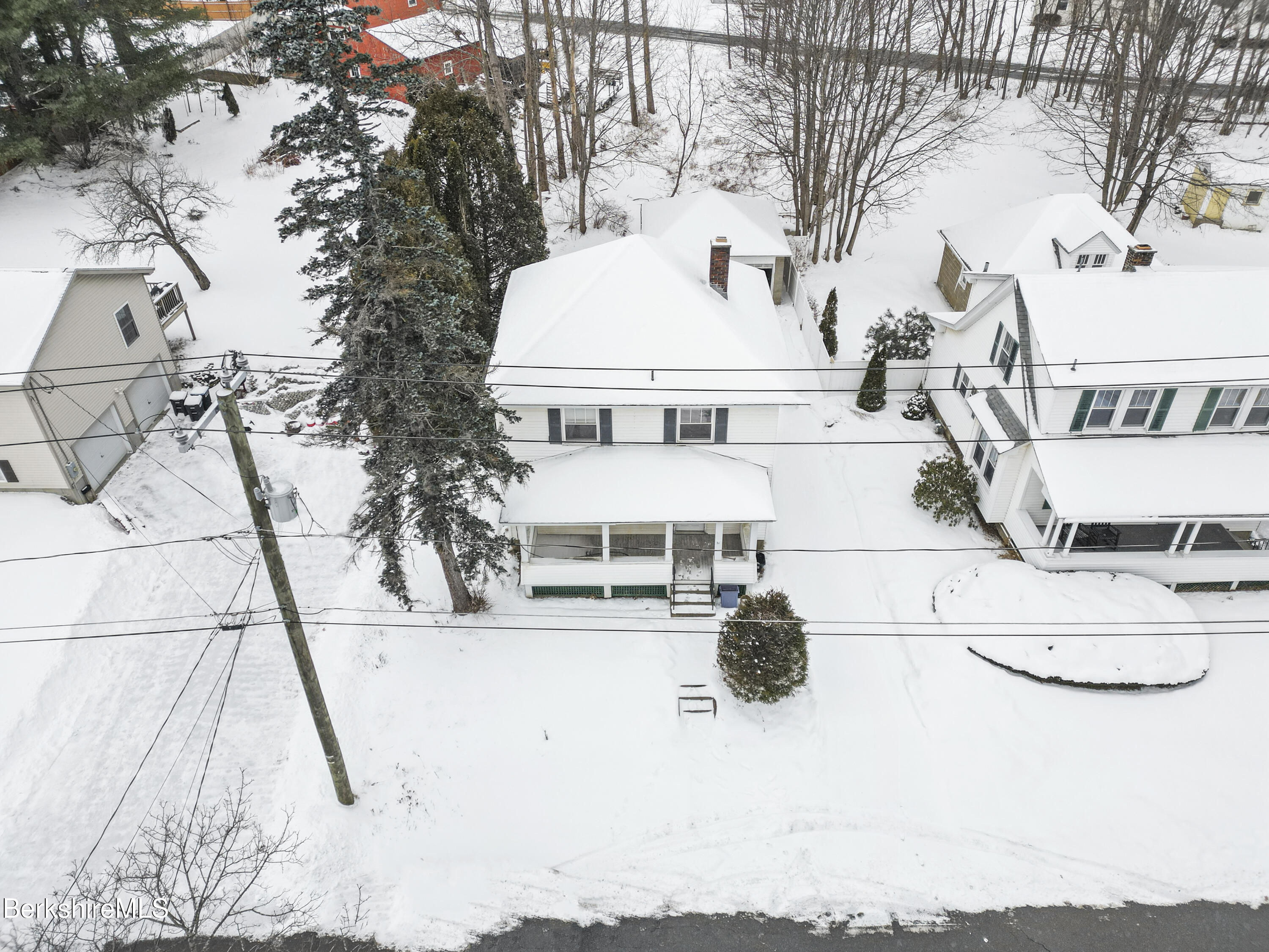 21 Ensign Avenue Pittsfield, MA 01201 - Photo 29 of 33 a view of residential houses with yard and trees