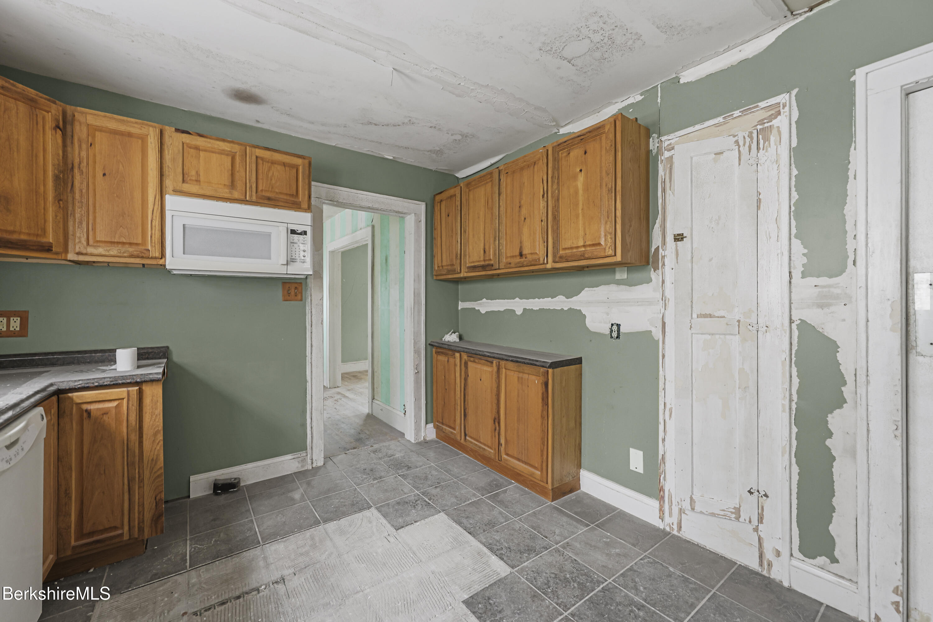 21 Ensign Avenue Pittsfield, MA 01201 - Photo 6 of 33 a view of cabinets with window