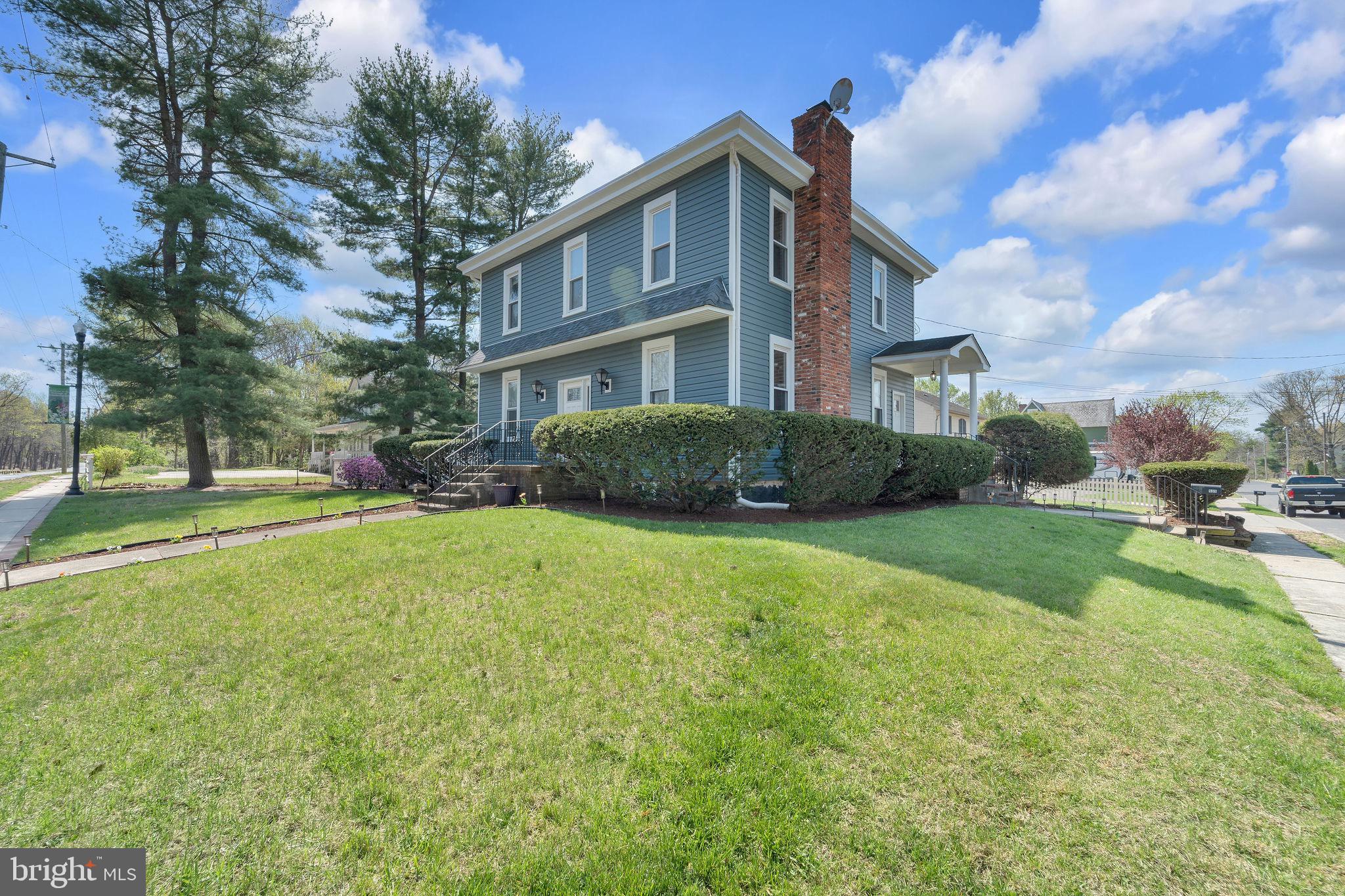 535 Chestnut Avenue Lindenwold, NJ 08021 - Photo 2 of 6 a front view of a house with a yard