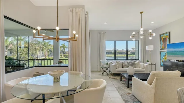 a bathroom with a granite countertop double vanity sink and mirror