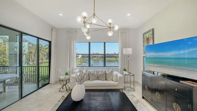 a bedroom with a bed and ceiling fan