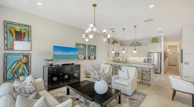 a bedroom with a bed and painting on the wall