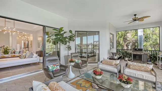 a front view of a house with a garden and plants