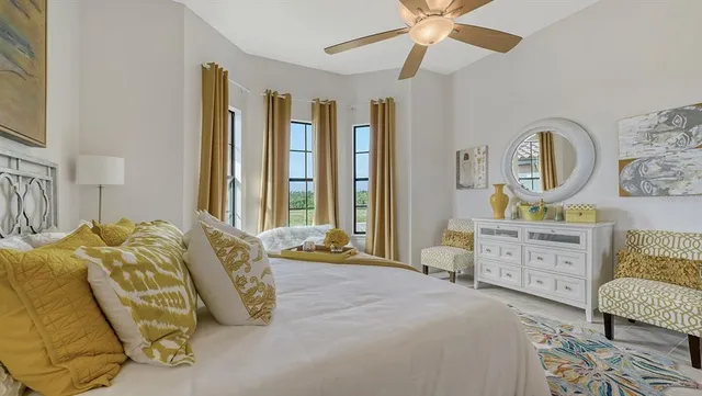 an aerial view of house with yard swimming pool and ocean view