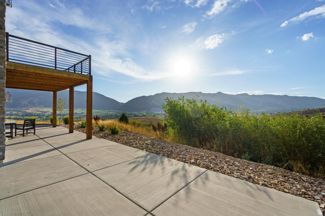 4499 North Seven Bridges Road, Unit 9 Eden, UT 84310 - Photo 47 of 65 Upper-level deck with black horizontal bar railing