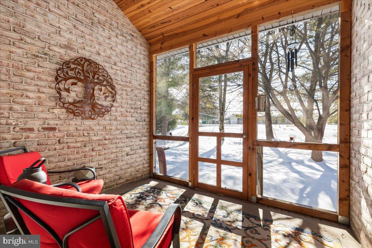 14 Ambler Lane Falling Waters, WV 25419 - Photo 21 of 43 Cozy sunlit porch with winter views.