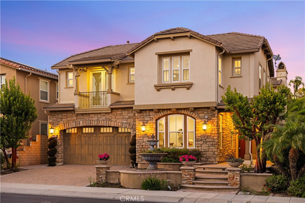 27684 Manor Hill Road Laguna Niguel, CA 92677 - Photo 1 of 1 a front view of a house with a garden
