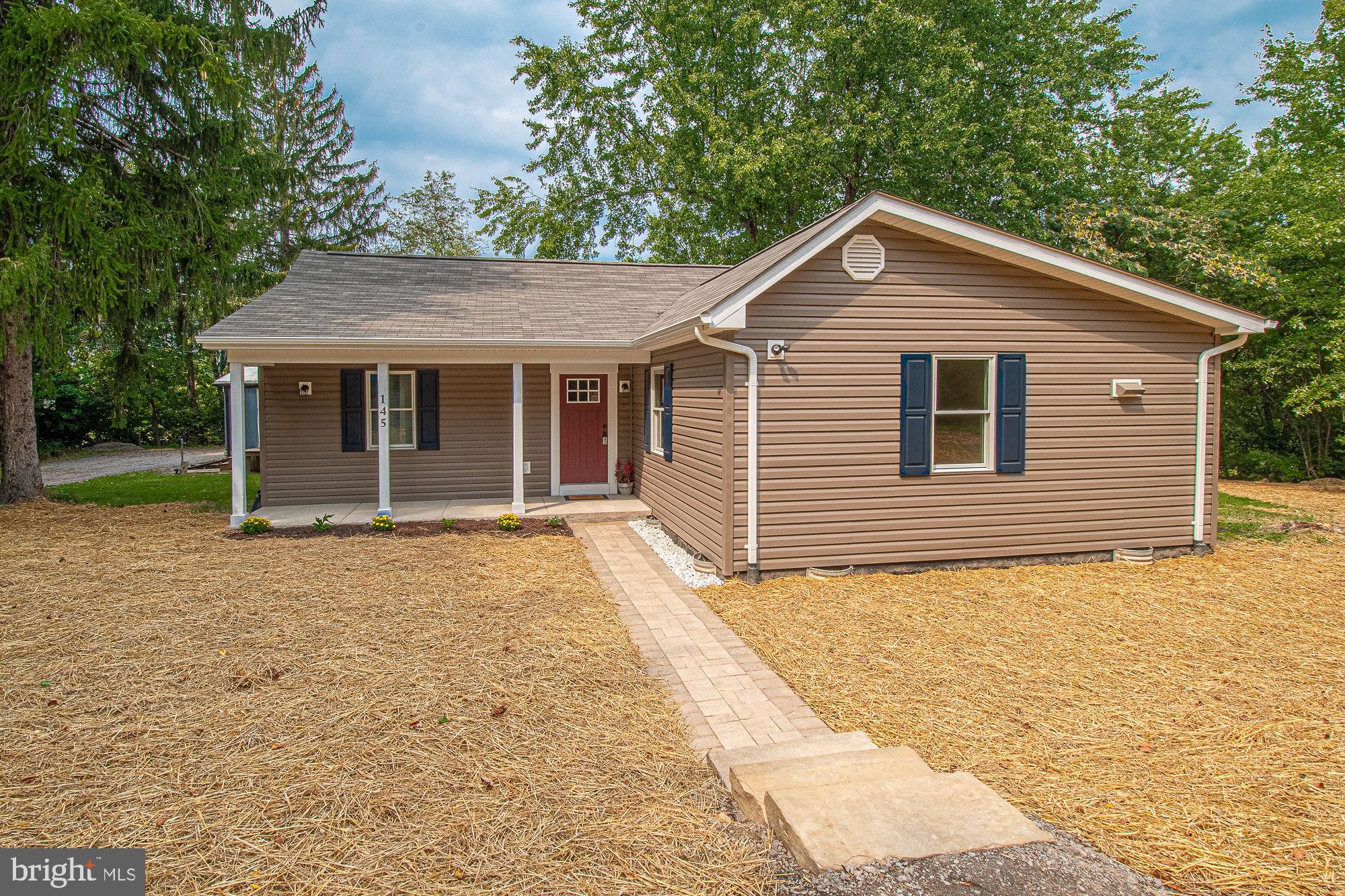 145 Cedar Grove Road Winchester, VA 22603 - Photo 2 of 41 New walkway, grass seed, and landscaping