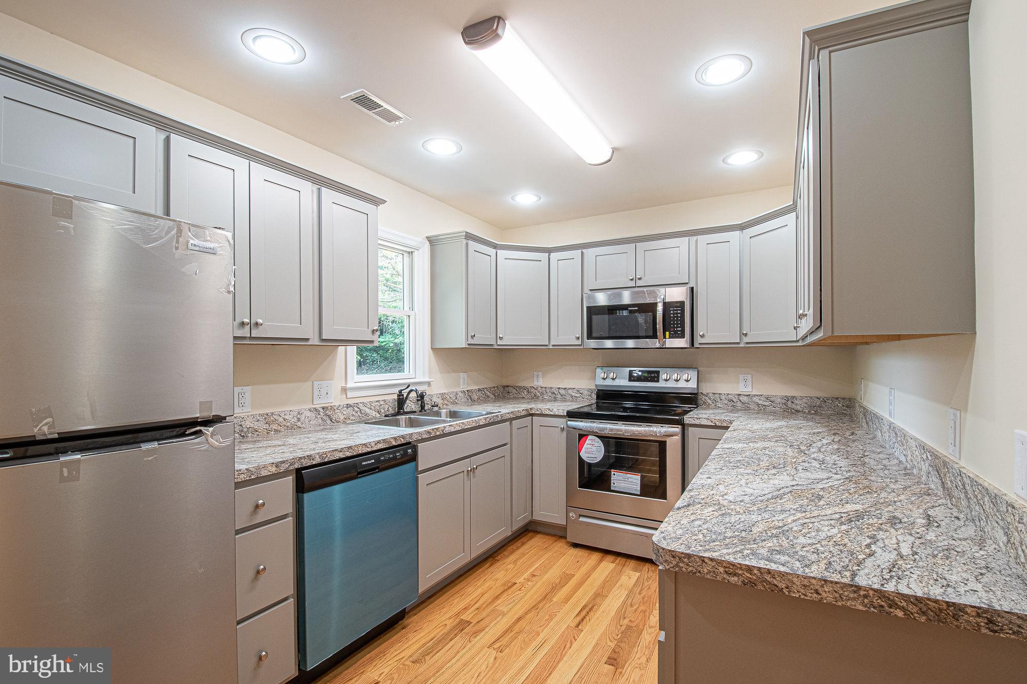 145 Cedar Grove Road Winchester, VA 22603 - Photo 11 of 41 Completely brand new renovated kitchen
