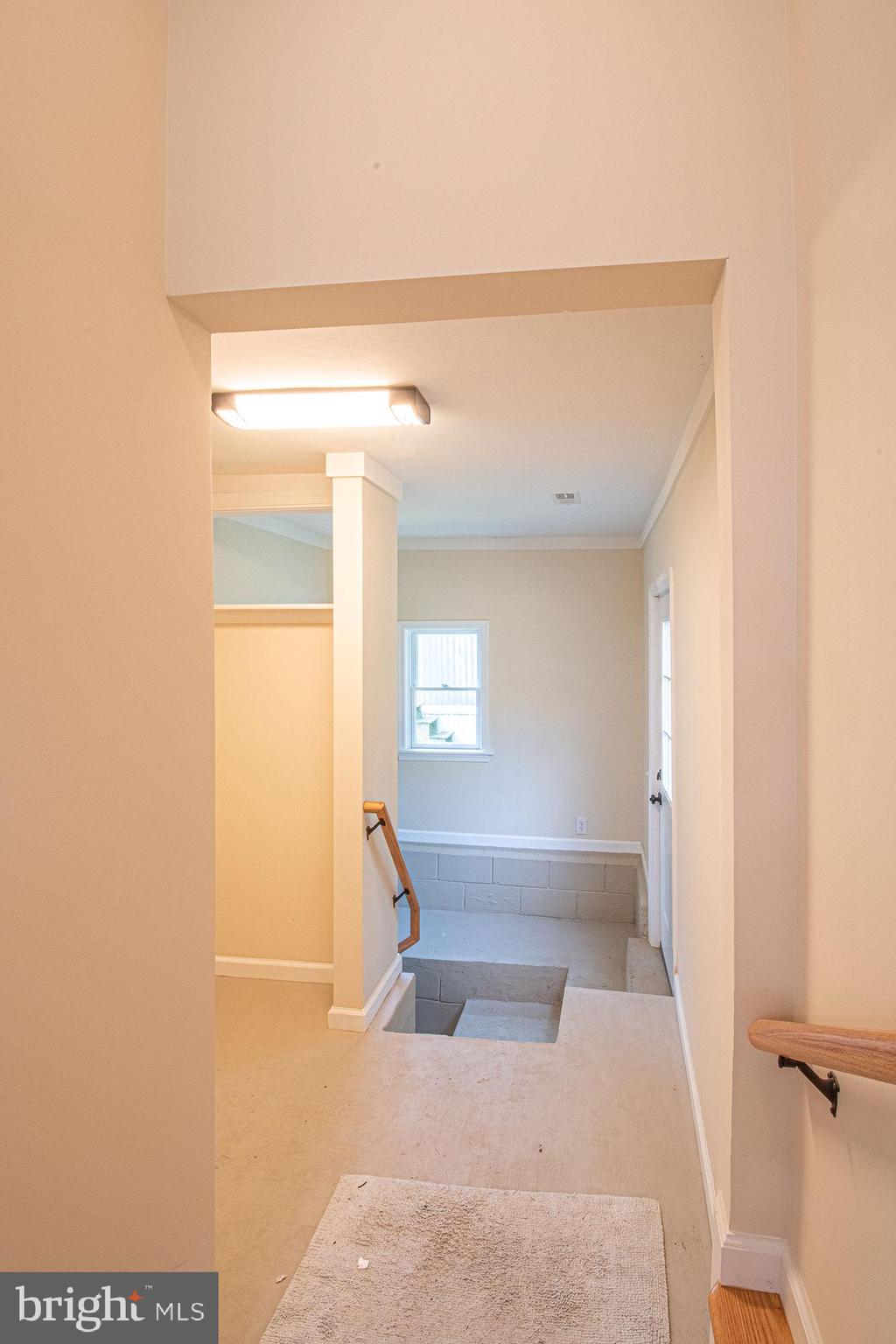 145 Cedar Grove Road Winchester, VA 22603 - Photo 21 of 41 hallway from kitchen to laundry room and basement