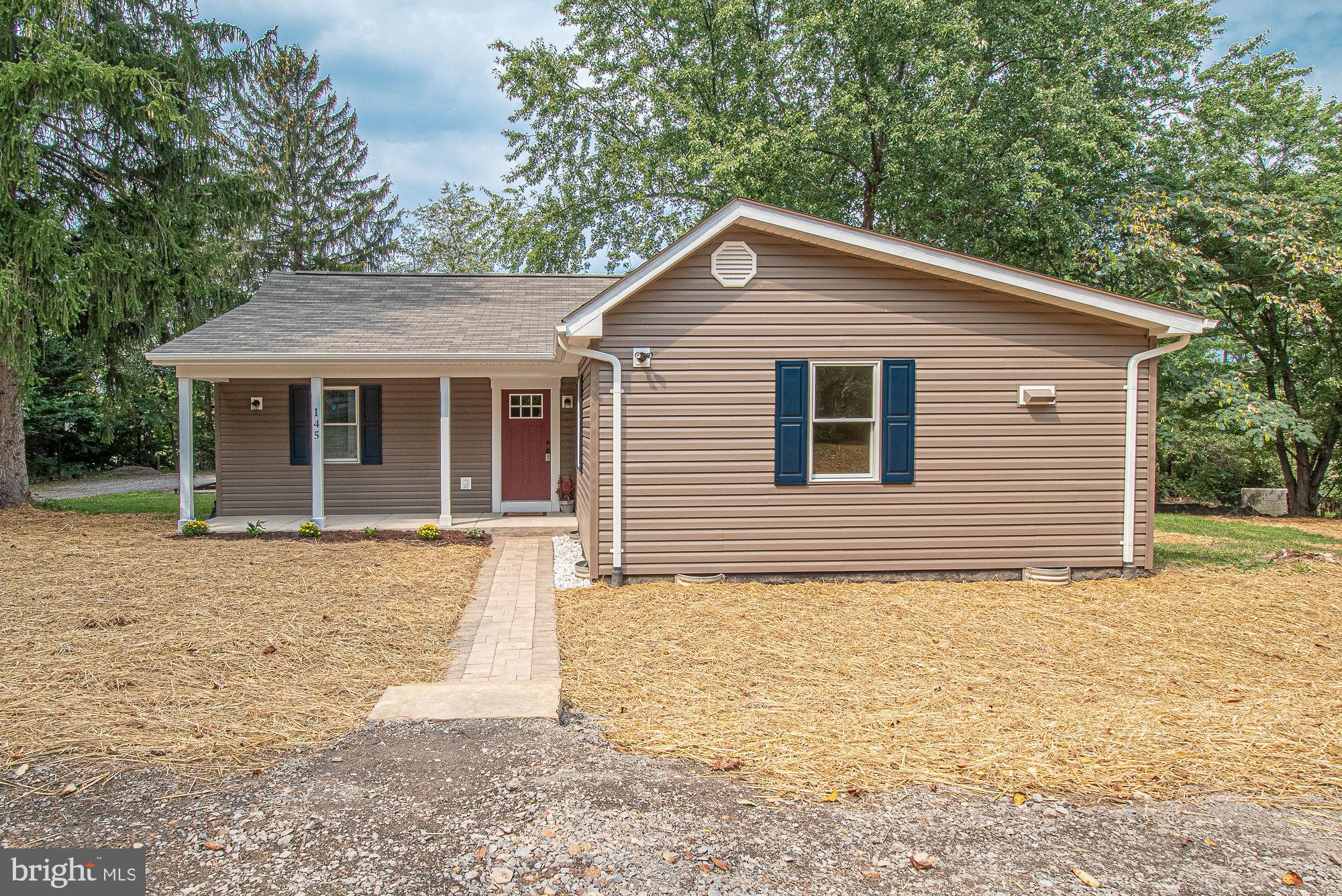 145 Cedar Grove Road Winchester, VA 22603 - Photo 4 of 41 Brand new siding, shutters and front door