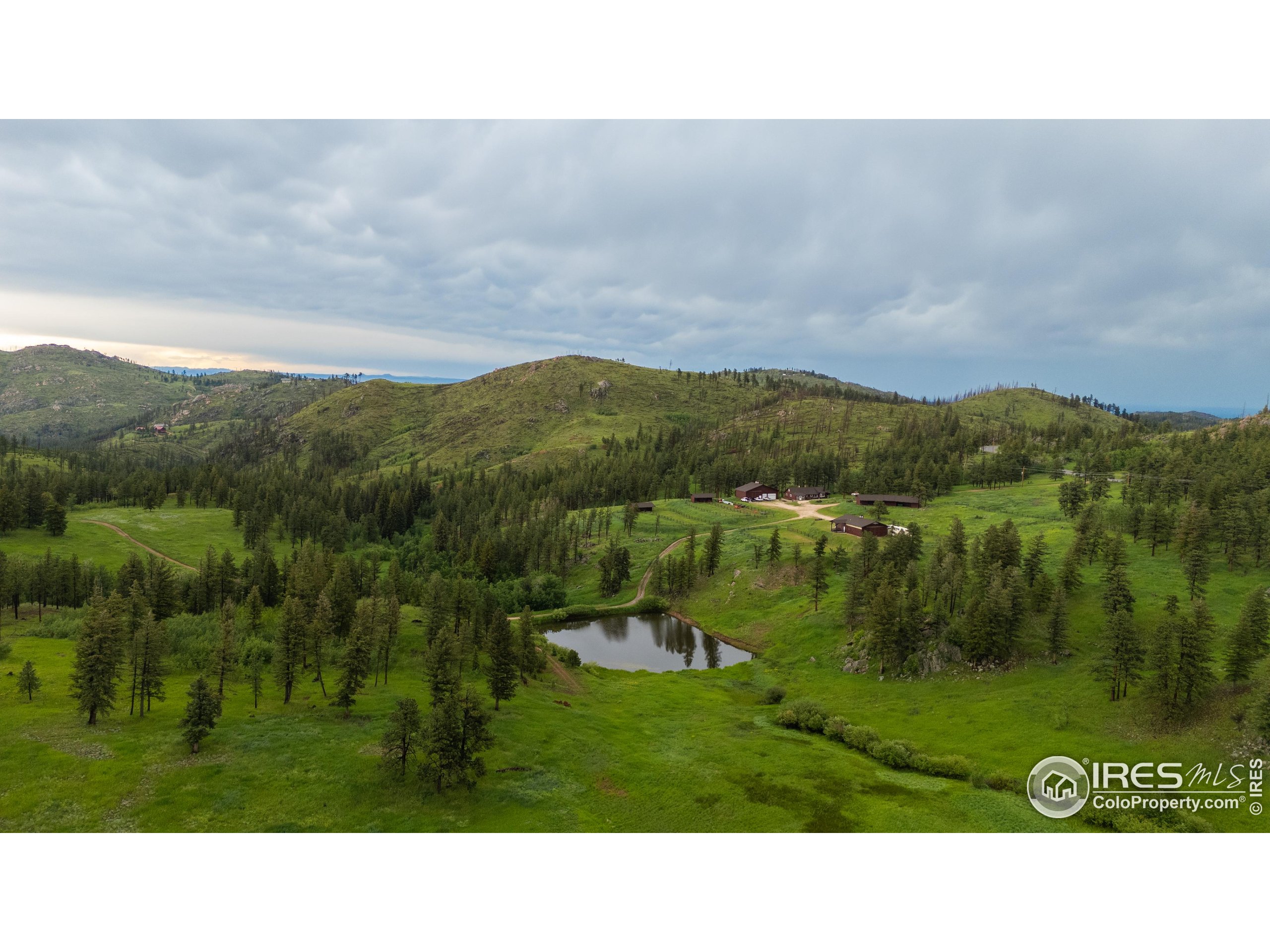 14884 Rist Canyon Road Bellvue, CO 80512 - Photo 24 of 40 a open area with mountains in the background