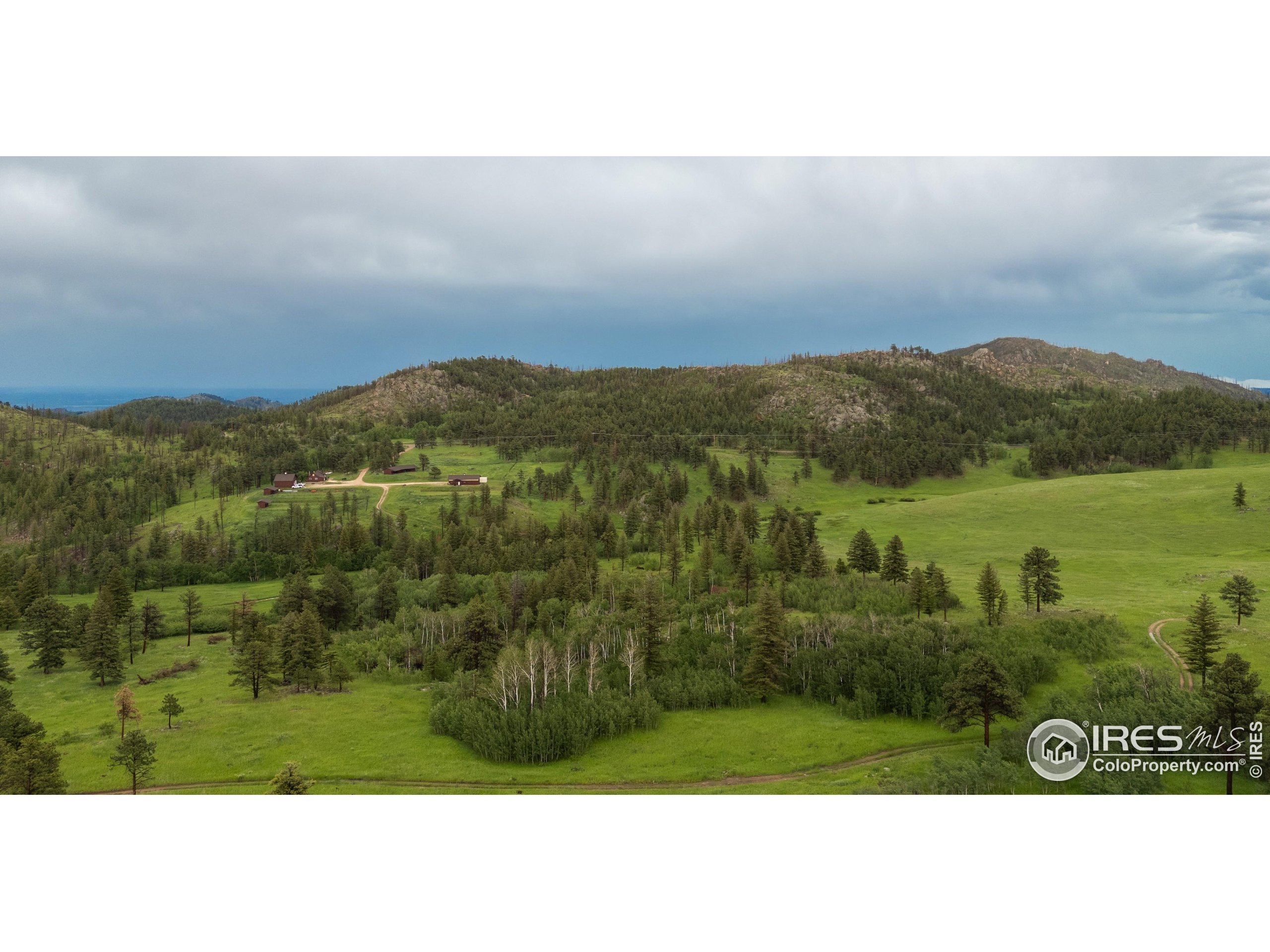 14884 Rist Canyon Road Bellvue, CO 80512 - Photo 3 of 40 a view of lake and mountain