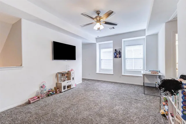 a very nice looking room with a big bed and a window