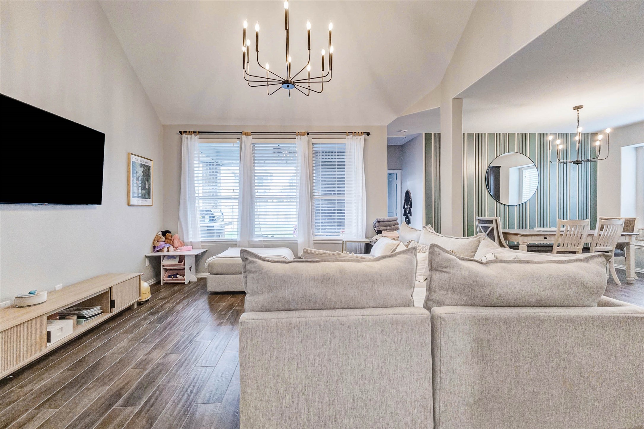 3210 Montclair Orchard Trace Spring, TX 77386 - Photo 9 of 38 a living room with furniture and a flat screen tv