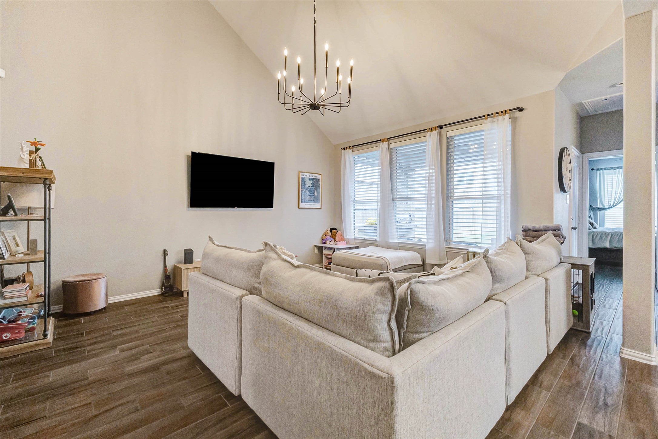 3210 Montclair Orchard Trace Spring, TX 77386 - Photo 10 of 38 a living room with furniture a flat screen tv and a large window