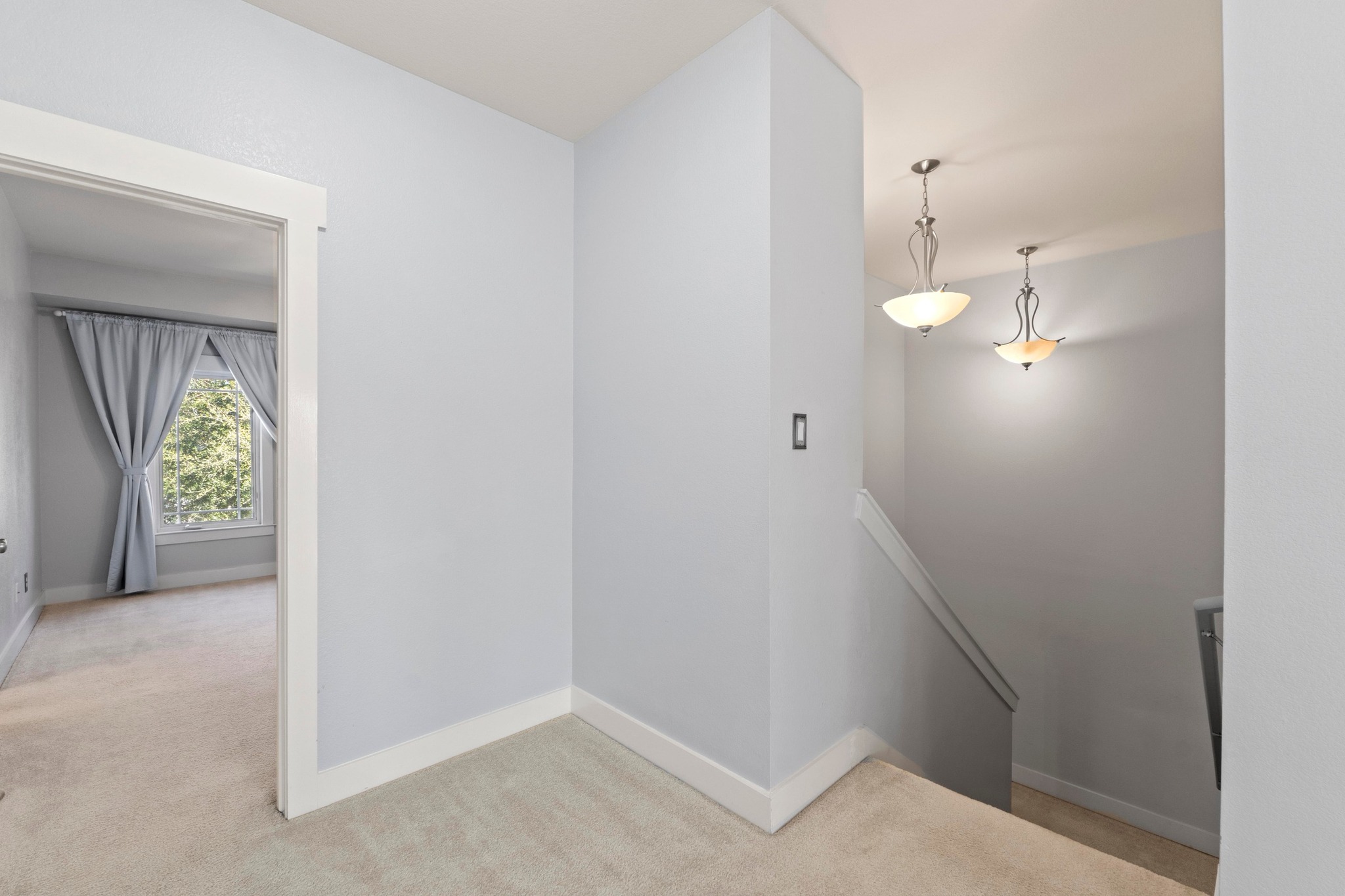 2930 Grand Oaks Loop, Unit 603 Cedar Park, TX 78613 - Photo 12 of 29 Staircase with carpet floors and baseboards that ends at an open landing
