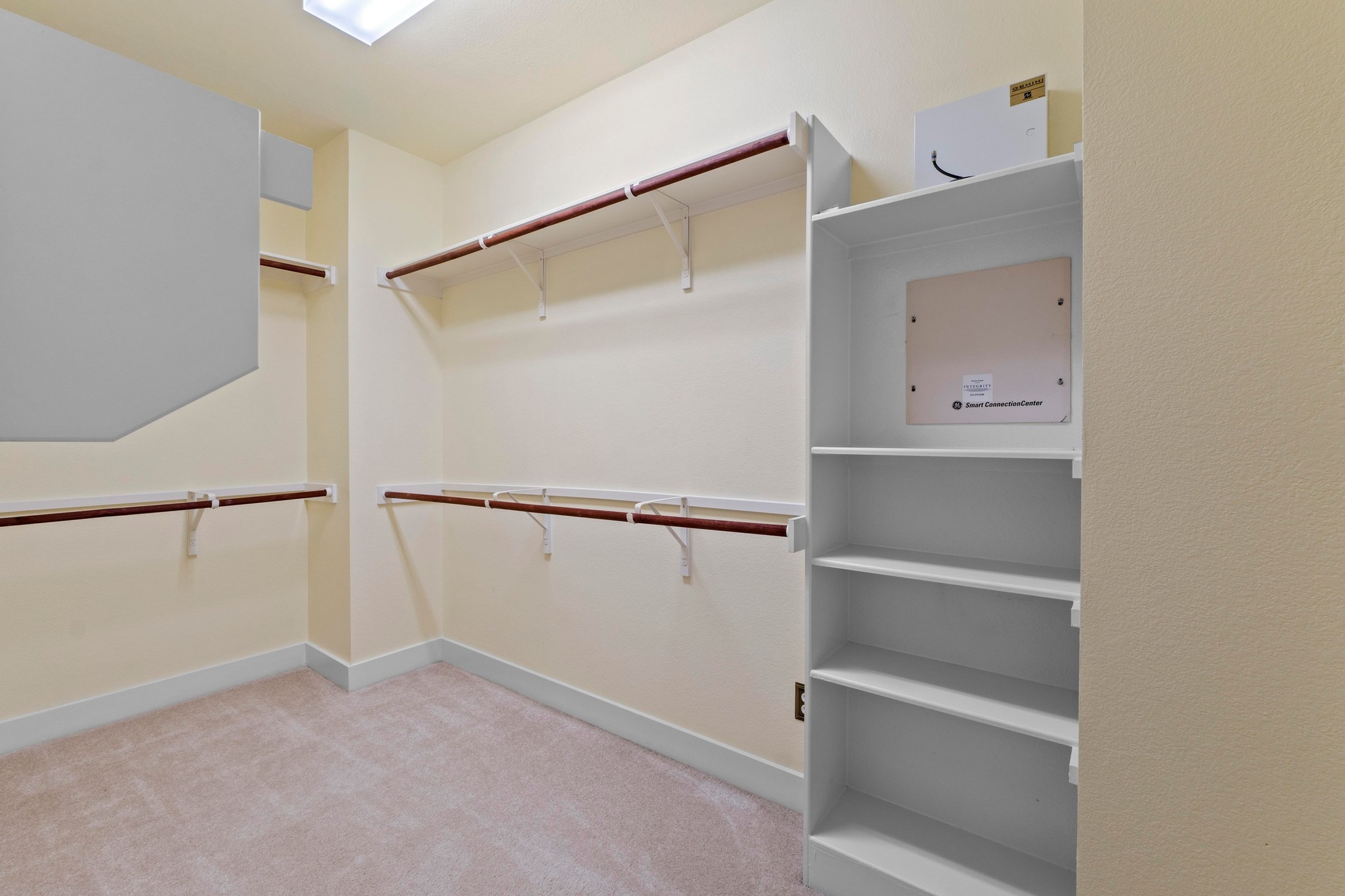 2930 Grand Oaks Loop, Unit 603 Cedar Park, TX 78613 - Photo 15 of 29 Walk-in closet featuring light carpet, built-in shelving