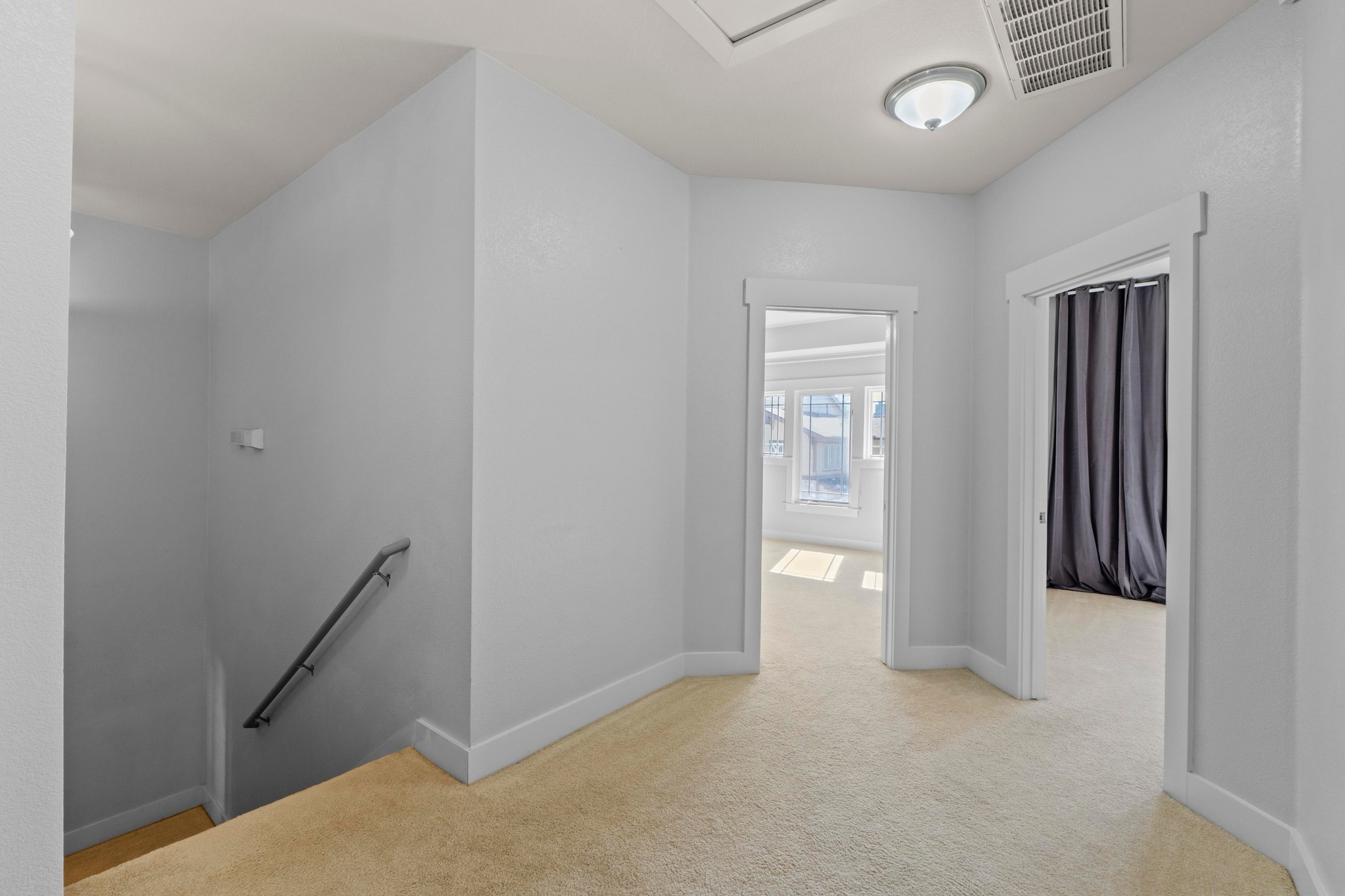2930 Grand Oaks Loop, Unit 603 Cedar Park, TX 78613 - Photo 18 of 29 Corridor featuring an upstairs landing and light carpet