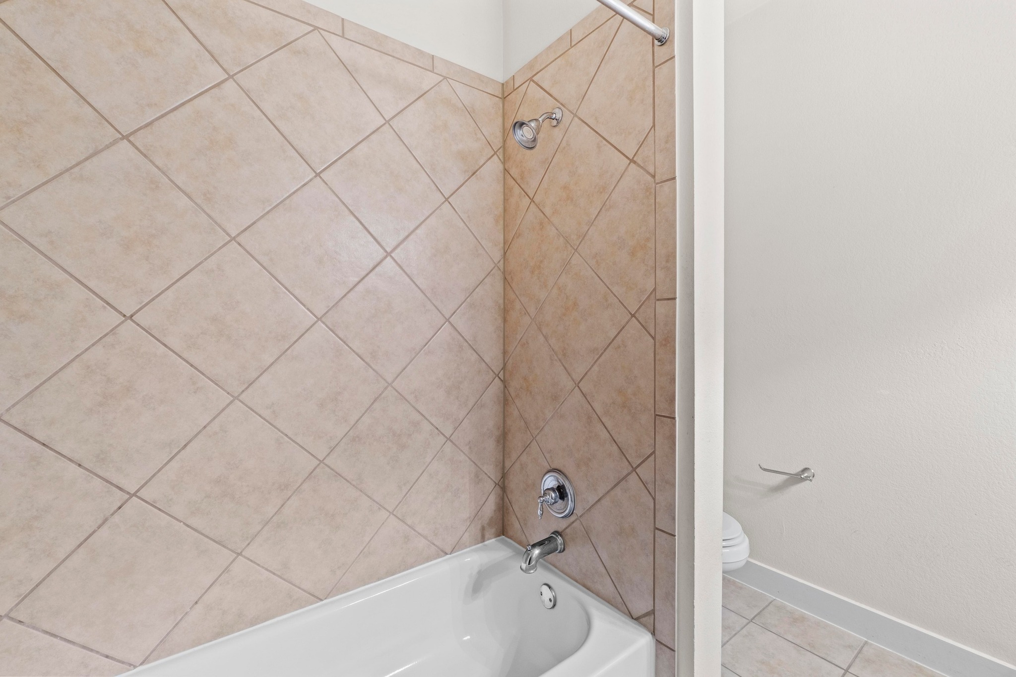 2930 Grand Oaks Loop, Unit 603 Cedar Park, TX 78613 - Photo 21 of 29 Bathroom featuring bathtub / shower combination and tile-patterned flooring