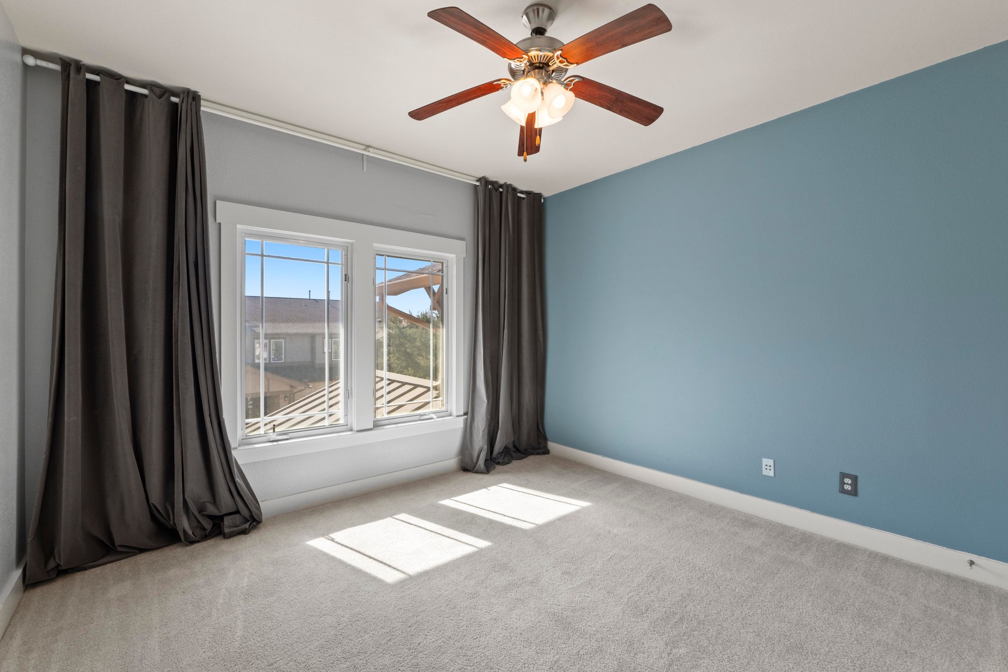 2930 Grand Oaks Loop, Unit 603 Cedar Park, TX 78613 - Photo 22 of 29 2nd Guest bedroom carpeted spare room with baseboards and a ceiling fan