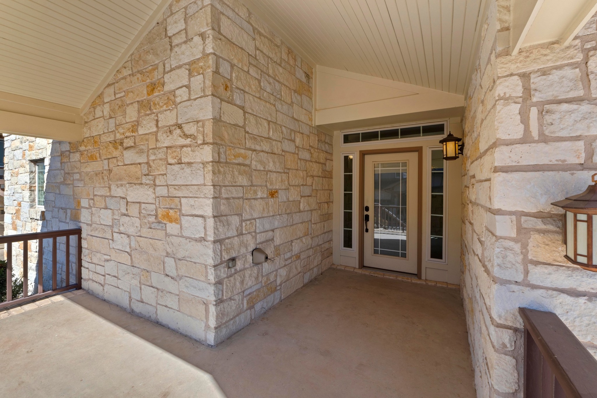 2930 Grand Oaks Loop, Unit 603 Cedar Park, TX 78613 - Photo 3 of 29 Doorway to property featuring stone siding