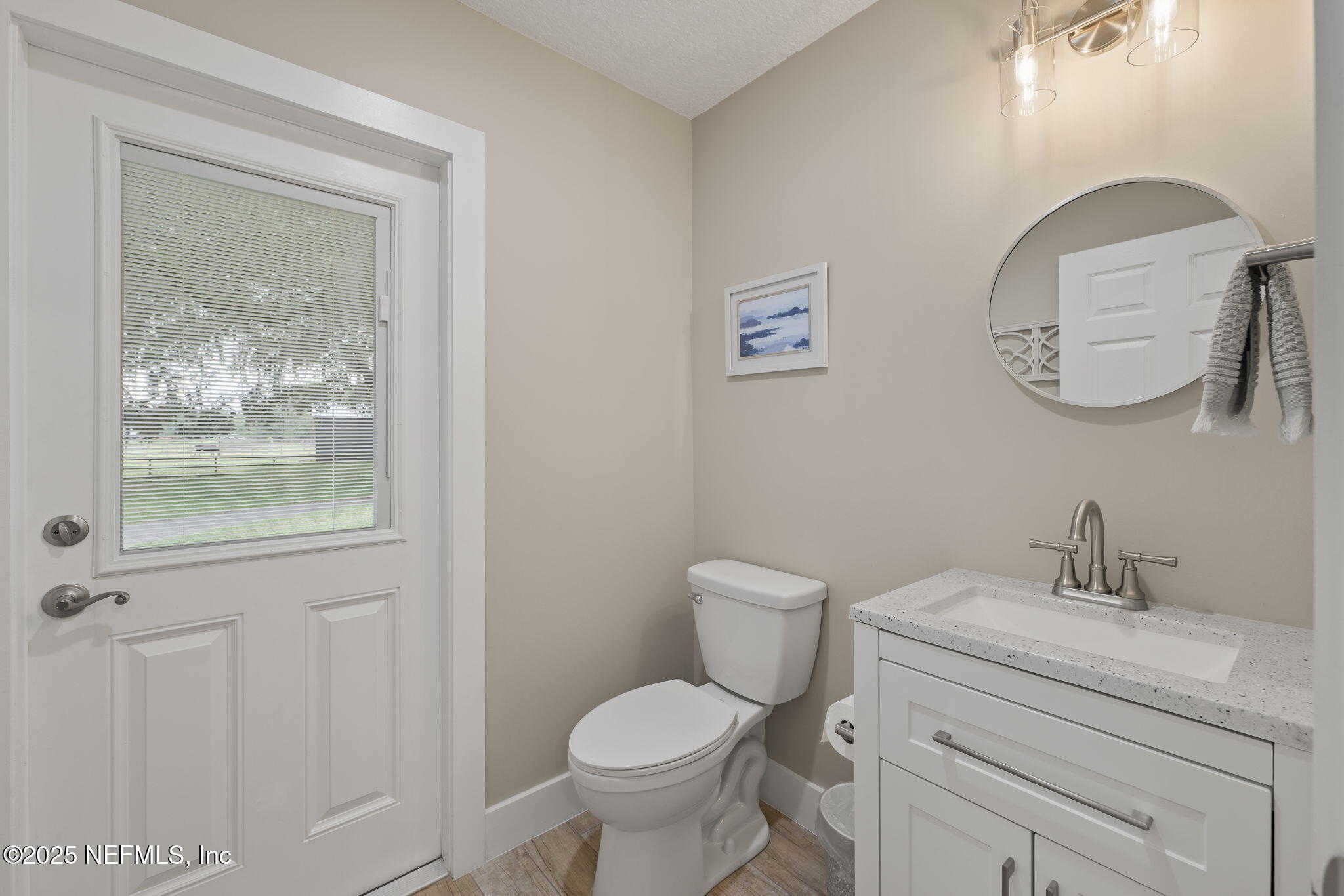 4575 Wolfe Road St. Augustine, FL 32092 - Photo 20 of 60 Half bath with outdoor access