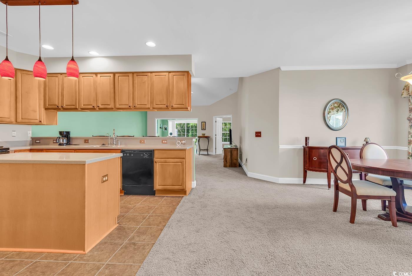 641 Botany Loop, Unit 63 Murrells Inlet, SC 29576 - Photo 2 of 40 Kitchen featuring hanging light fixtures, light countertops, light carpet, recessed lighting, and dishwasher