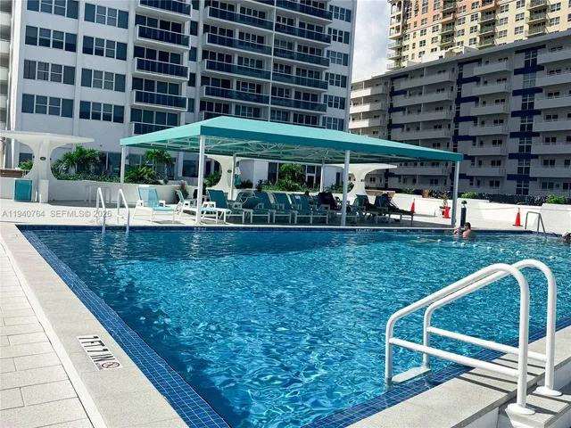 a view of a building with a garden