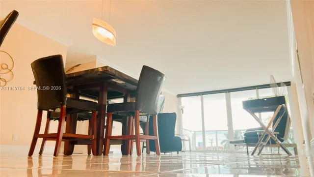 a view of balcony with furniture