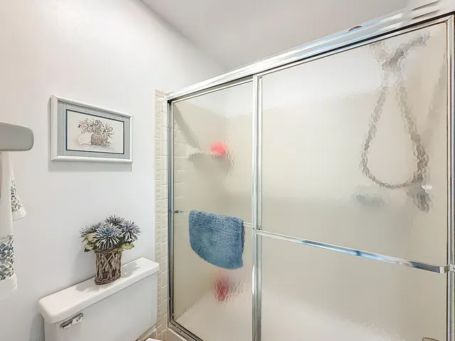 a view of a livingroom with furniture and front door