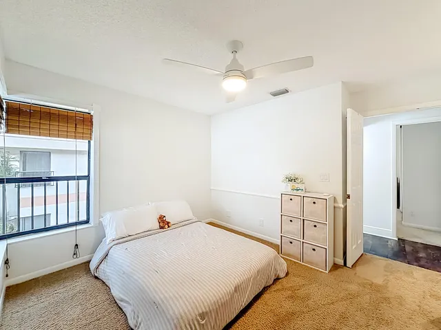 a aerial view of a house with a yard