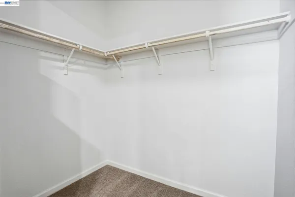 a view of an empty walk in closet