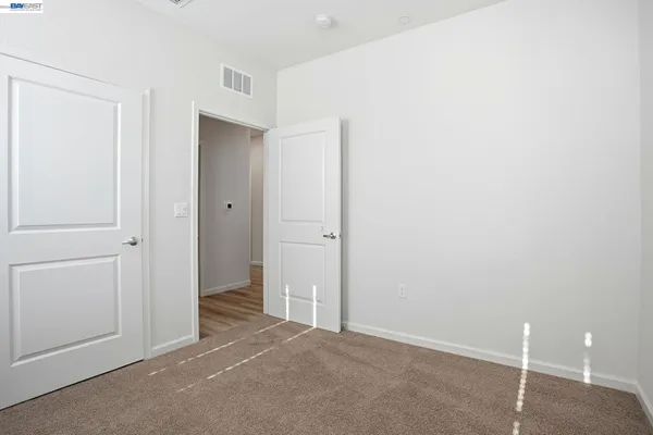 a view of a room with an empty space