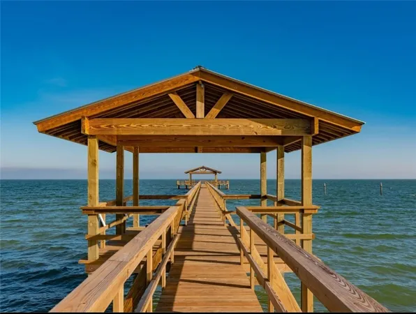 a view of a balcony with furniture