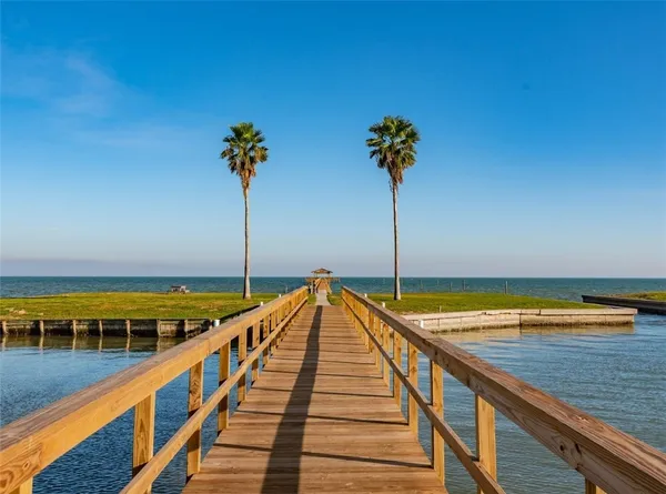 a view of a balcony with an ocean view