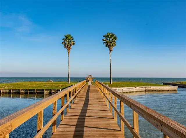 a view of a balcony with an ocean view