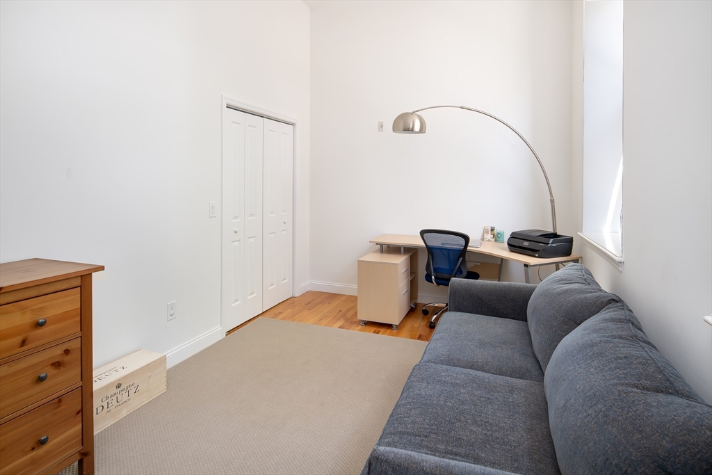 11 Wyman Street, Unit 2B Boston, MA 02130 - Photo 9 of 11 a living room with furniture
