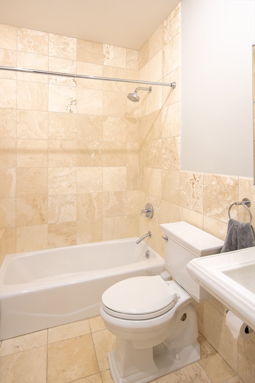 11 Wyman Street, Unit 2B Boston, MA 02130 - Photo 10 of 11 a bathroom with a toilet sink and shower