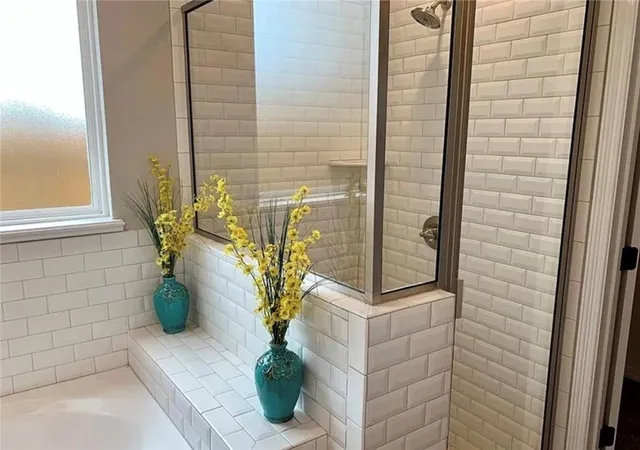 a potted plant sitting in front of a door