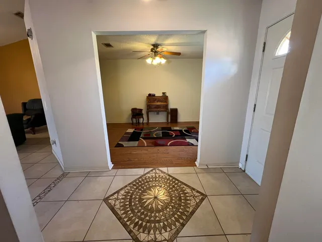 a room with gym equipment and a mirror
